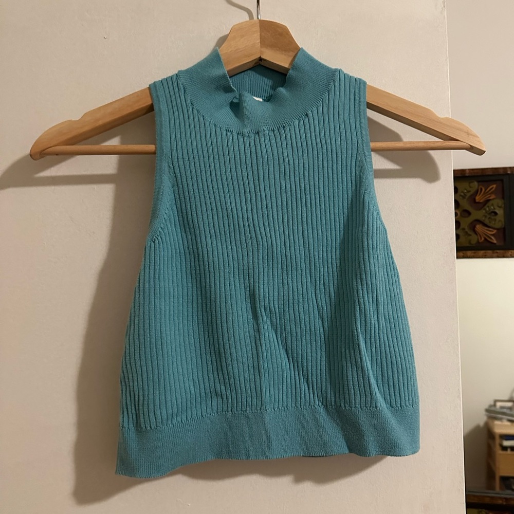 Blue Uniqlo mock neck crop top. Size S